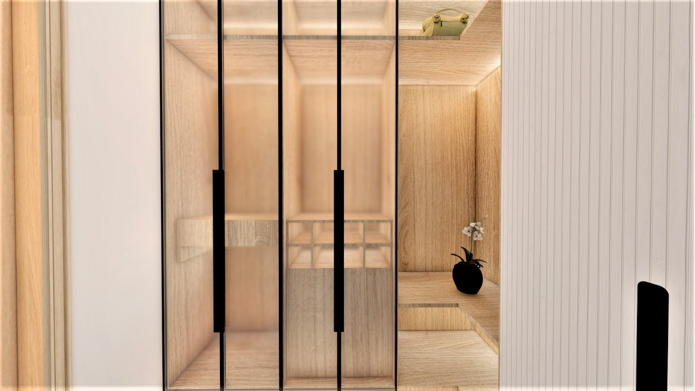 Bathroom with black toilet, wall niche, marble tiles and wood cabinetry.