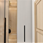 Thumbnail of http://Walk-in%20shower%20with%20glass%20screen,%20black%20shower%20fittings%20and%20marble%20wall.