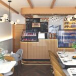 Thumbnail of http://Modern%20Greenleaf%20Cafe%20in%20Notting%20Hill%20main%20dining%20area%20with%20wood%20panelling%20and%20green%20wall.​