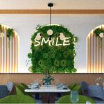 Thumbnail of http://Modern%20Greenleaf%20Cafe%20in%20Notting%20Hill%20dining%20space%20with%20green%20velvet%20seating%20and%20feature%20wall.