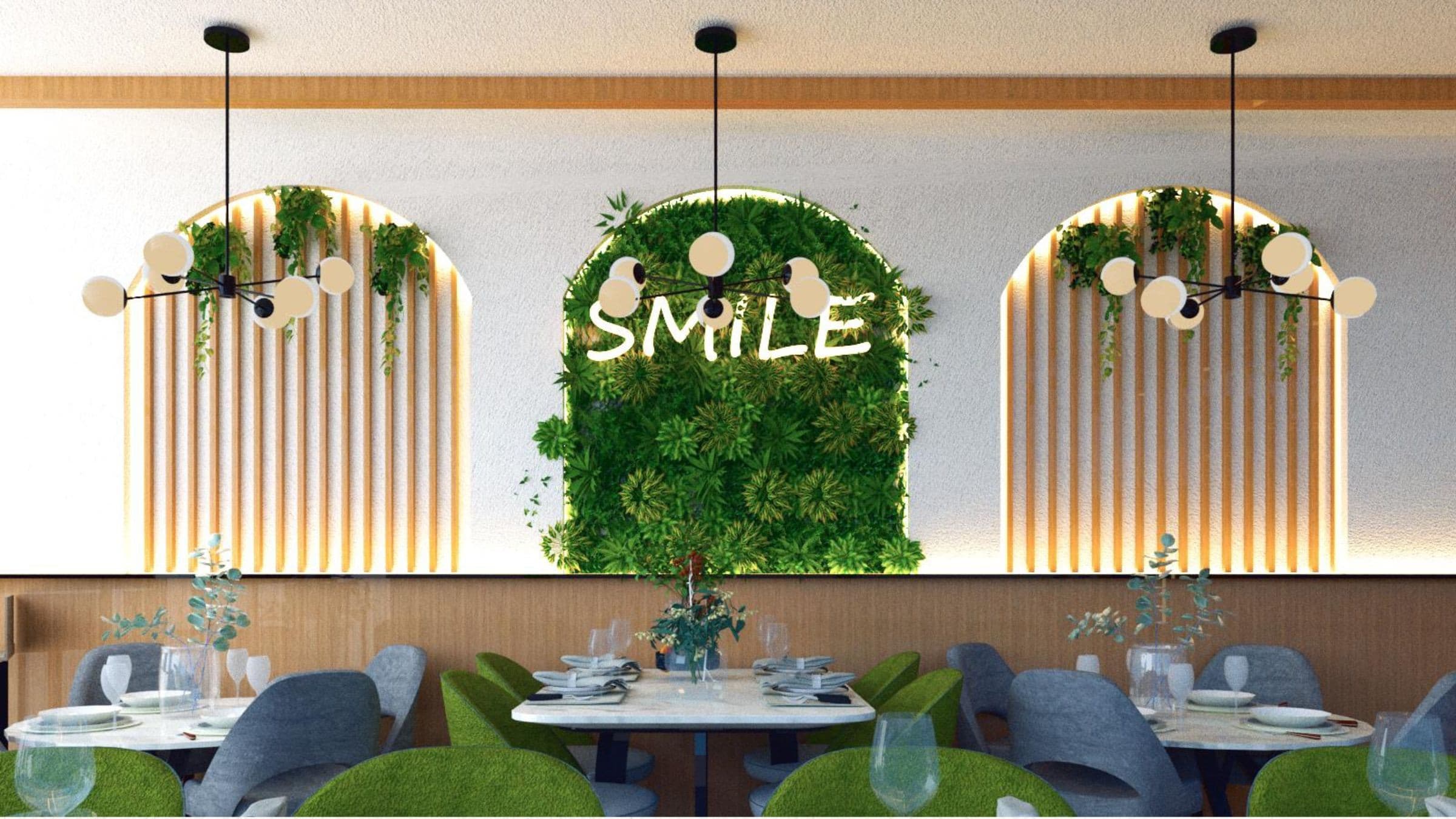 Modern Greenleaf Cafe in Notting Hill dining space with green velvet seating and feature wall.