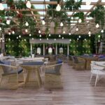 Thumbnail of http://Nature-inspired%20high-end%20restaurant%20with%20transparent%20glass%20ceiling%20covered%20in%20hanging%20plants%20and%20vines,%20natural%20wood%20flooring,%20white%20modern%20dining%20chairs%20and%20tables,%20grey%20upholstered%20booth%20seating,%20potted%20greenery,%20and%20light-filled%20airy%20atmosphere%20in%20Notting%20Hill