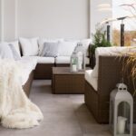 Thumbnail of http://Chic%20boho%20balcony%20in%20Caterham%20with%20rattan%20corner%20sofa,%20soft%20textiles,%20and%20potted%20grasses.