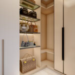 Thumbnail of http://Modern%20walk-in%20closet%20with%20sleek%20handleless%20cabinets,%20LED%20shelving,%20wooden%20door%20and%20minimalist%20design%20in%20Dorking