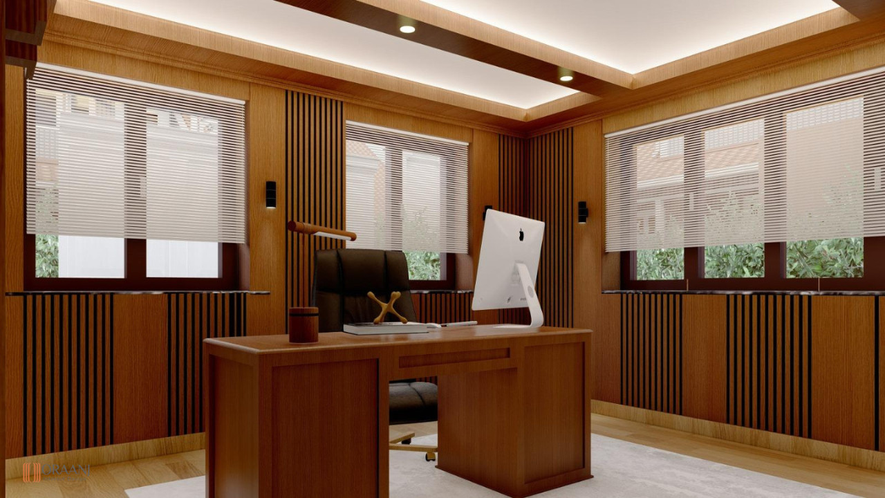 Distinguished traditional study with ornate mahogany office desk featuring decorative carved elements, tufted black leather office chair with classic upholstery, slatted wood wall panels with vertical orientation creating refined atmosphere, heritage wooden cabinets with traditional joinery for organized storage, wooden bookshelf units with shelving for books and objects, classic recessed lighting fixtures in ceiling, rich warm wood tones creating cohesive scheme, white stepped ceiling with tray design, large window openings with white roller window treatments, neutral beige carpet floor covering, framed artwork displays on walls, vintage style office accessories and decorative elements, antique wooden furniture pieces with traditional design, executive professional workspace atmosphere, formal business office setting, perpetual sophisticated style with classic appeal, oak wood material accents, premium quality office furniture selections, scholarly cultured environment with literary elements, and traditional interior design in East Ham