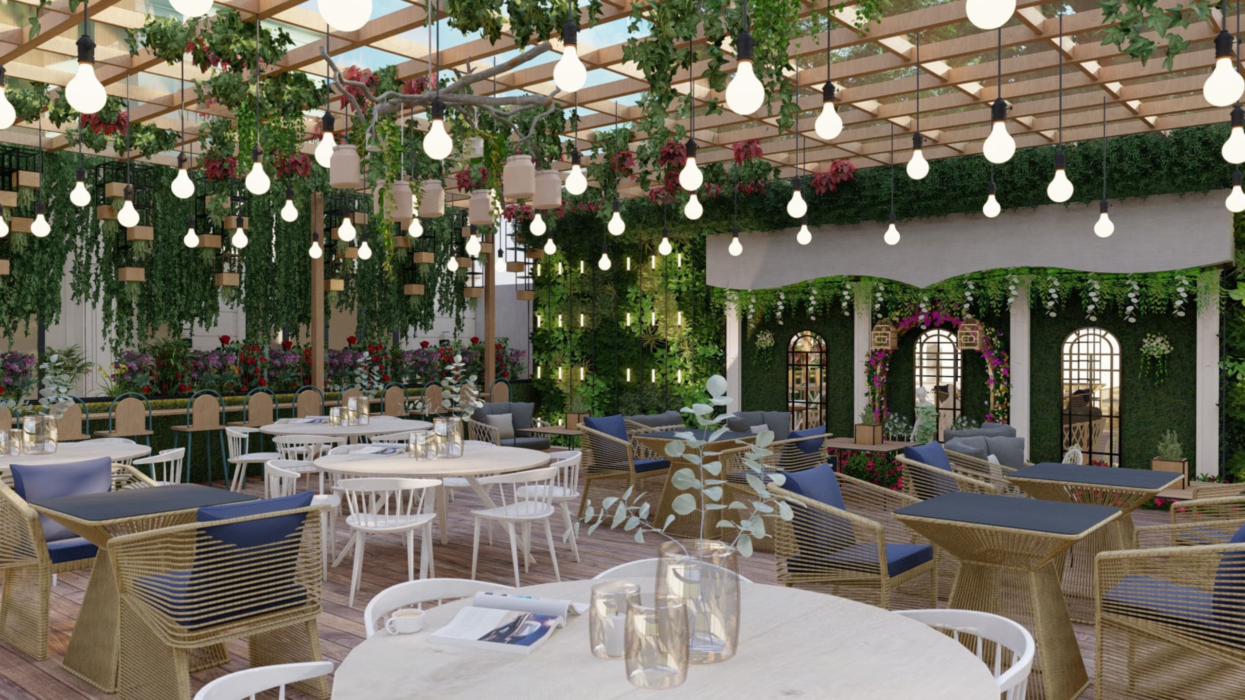 Wide-angle view of high-end restaurant interior with cascading hanging plants and vines from ceiling, vintage Edison bulb string lights, natural wood banquette seating with blue and green cushions along walls, white modern dining tables in foreground, glass partition with greenery, arched windows, and light-filled spacious atmosphere in Notting Hill