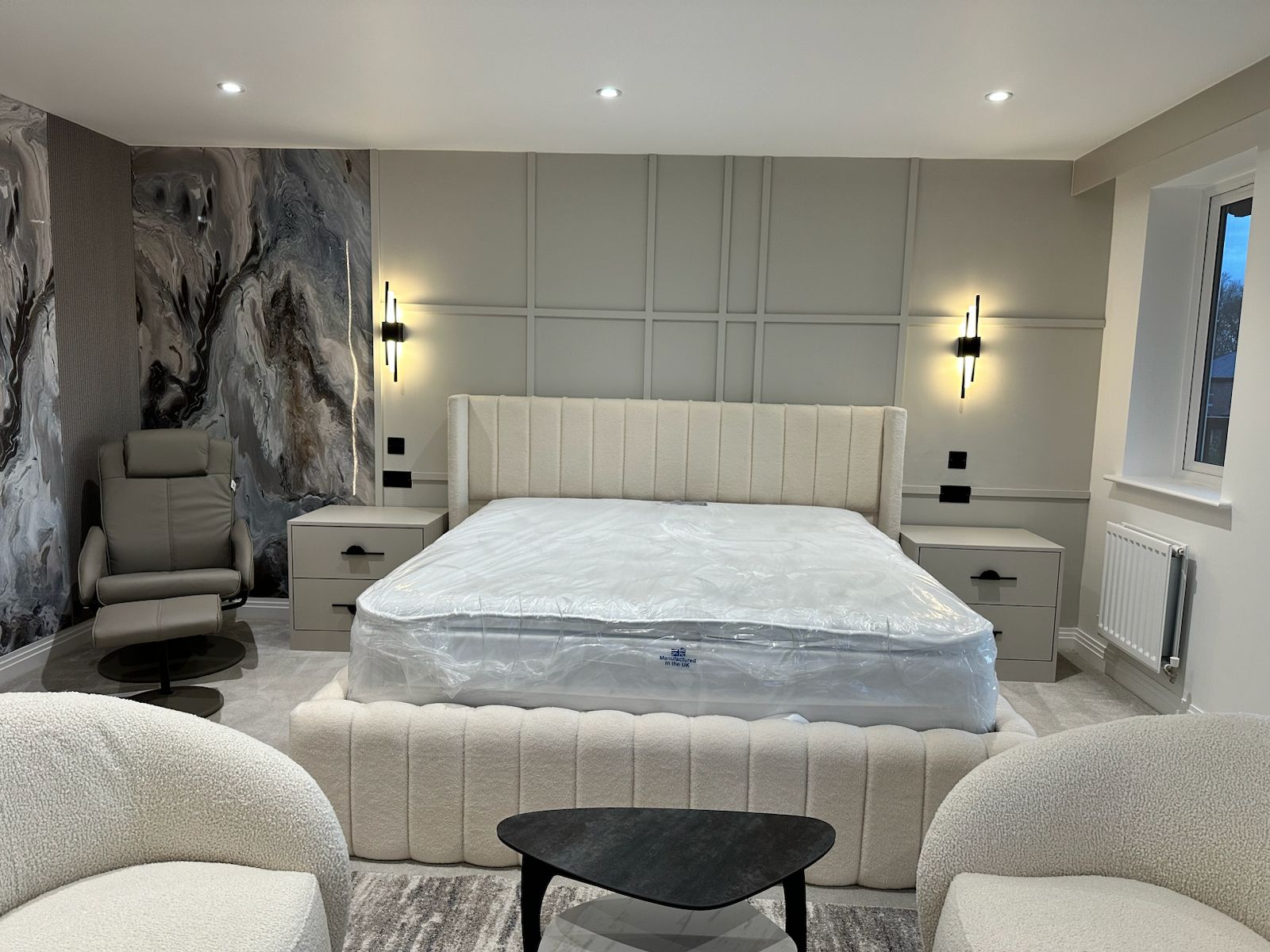 Luxury bedroom interior design in Mayfair, London with soft neutral tones and bespoke cabinetry