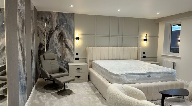 Soft neutral luxury bedroom with sculptural furniture and upholstered finishes in London