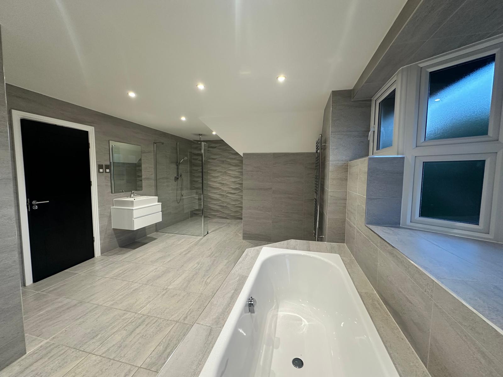 Wall-hung vanity units in modern luxury bathroom with sleek contemporary finish in Knightsbridge