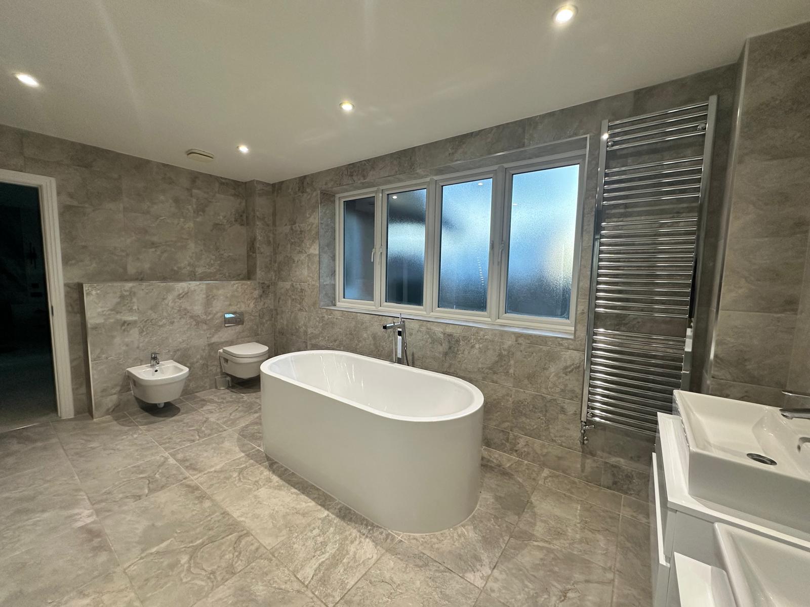 Spa-inspired bathroom interior design in Knightsbridge with premium materials and soft lighting