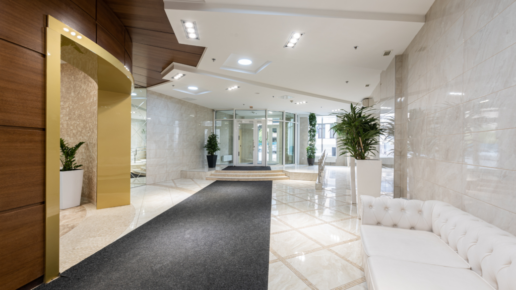 Premium luxury design features sophisticated marble floors while luxurious gold elements fuse with elegant furniture to present modern elegance throughout the space. 